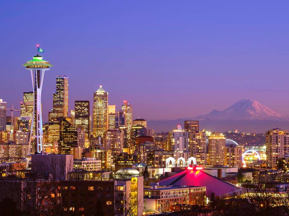 A scenic view of the Space Needle in Seattle, WA and the Mt. Rainier is visible in the background. This picture taken from Kerry Park, Queen Anne area on January 29, 2015 at 17:50. 