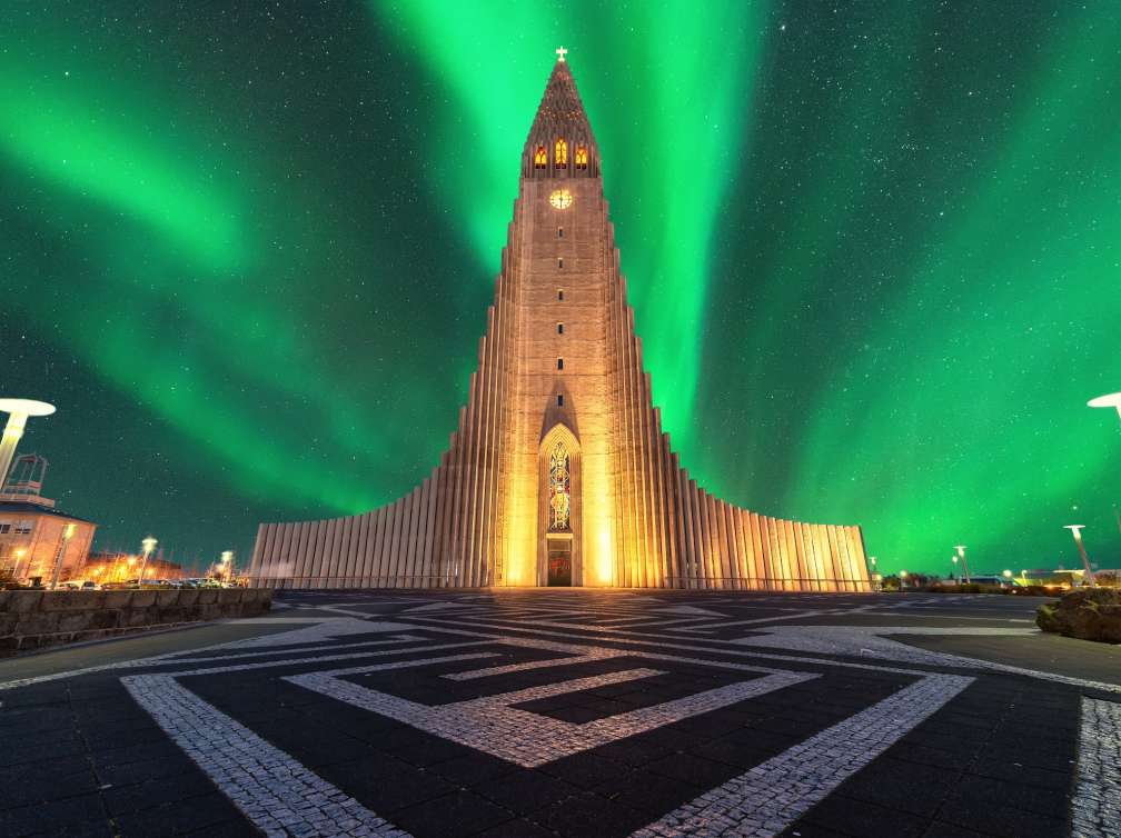 aurora borealis above hallgrimskirkja church in central of reykjavik city capital city in Iceland