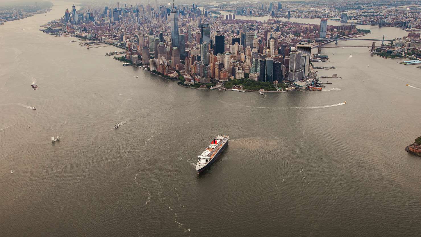 Aerial view of Queen Mary 2 leaving New York