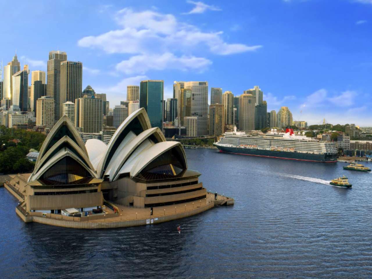 Cunard's Queen Elizabeth in Sydney, Australia, alongside the Opera House