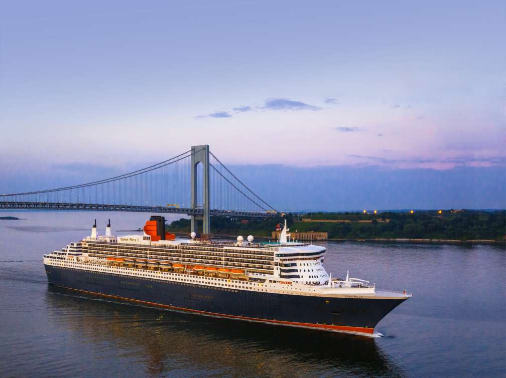 Queen Mary 2 sailing by Verrazano Bridge, New York 