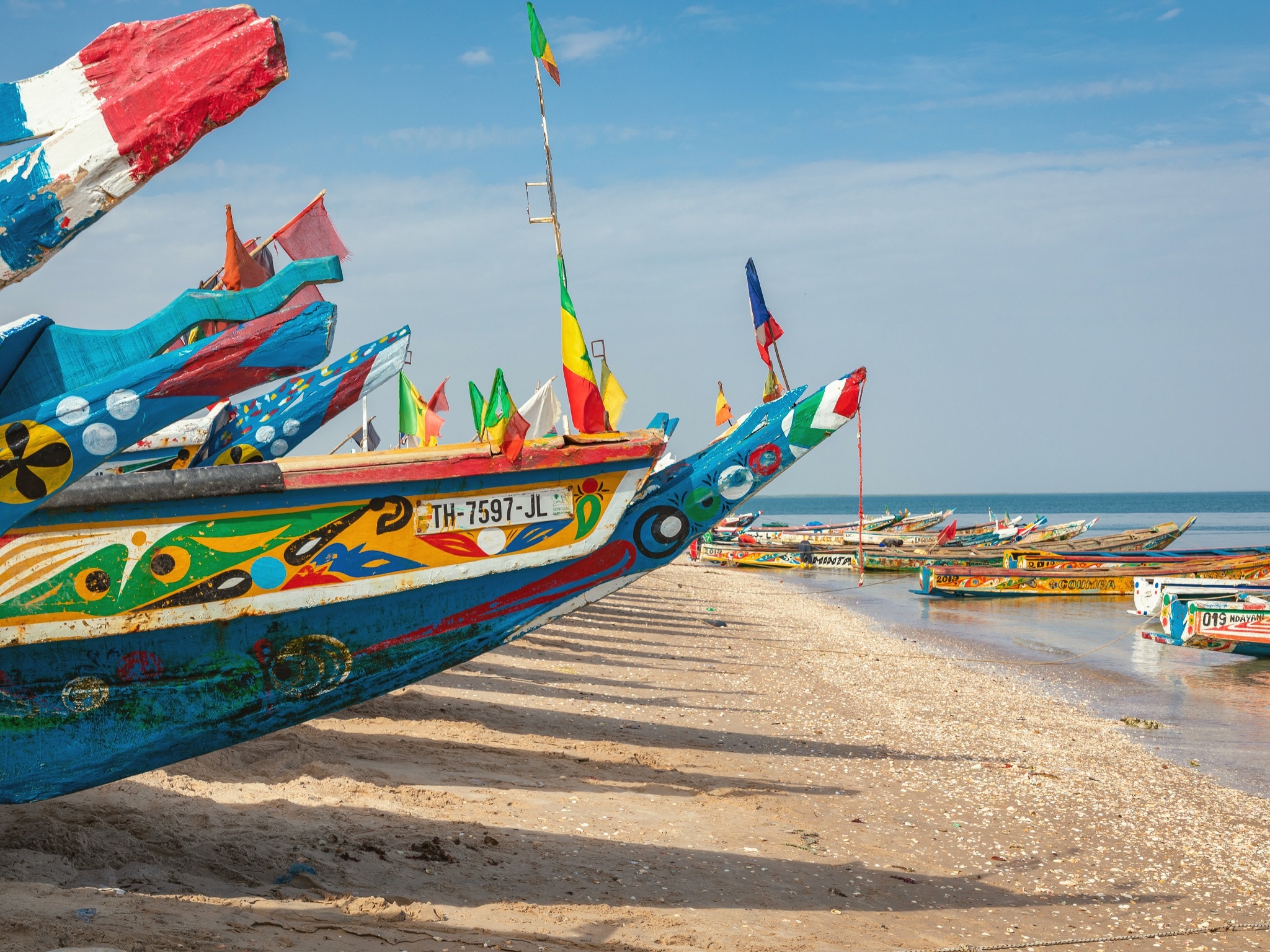 {"metadata_en_GB":{"alt-text":"Djiffer, Senegal - November 17, 2019: Traditional painted wooden fishing boat in Djiffer, Senegal. West Africa."},"metadata_de_DE":{"alt-text":"Djiffer, Senegal - November 17, 2019: Traditional painted wooden fishing boat in Djiffer, Senegal. West Africa."},"metadata_en_AU":{"alt-text":"Djiffer, Senegal - November 17, 2019: Traditional painted wooden fishing boat in Djiffer, Senegal. West Africa."},"metadata_en_US":{"alt-text":"Djiffer, Senegal - November 17, 2019: Traditional painted wooden fishing boat in Djiffer, Senegal. West Africa."}}