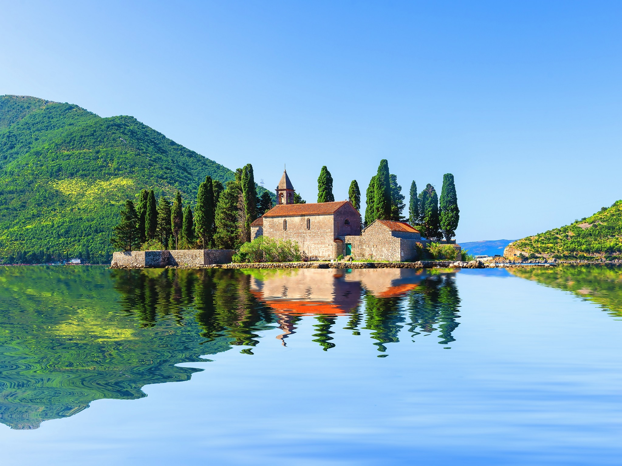 {"metadata_en_GB":{"alt-text":"St. George island or Island of Dead in Kotor Bay near Perast, Montenegro"},"metadata_en_AU":{"alt-text":"St. George island or Island of Dead in Kotor Bay near Perast, Montenegro"},"metadata_en_US":{"alt-text":"St. George island or Island of Dead in Kotor Bay near Perast, Montenegro"}}