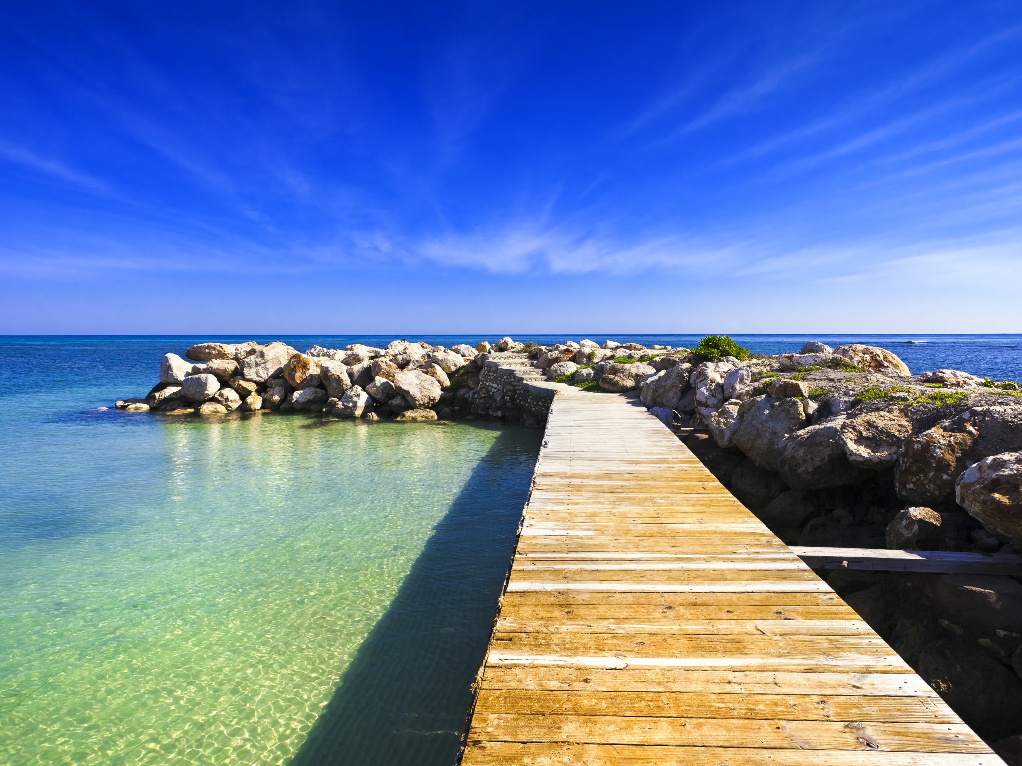 {"metadata_en_GB":{"alt-text":"Boardwalk reaching out to sea in Montego Bay, Jamaica"},"metadata_en_AU":{"alt-text":"Boardwalk reaching out to sea in Montego Bay, Jamaica"},"metadata_en_US":{"alt-text":"Boardwalk reaching out to sea in Montego Bay, Jamaica"}}