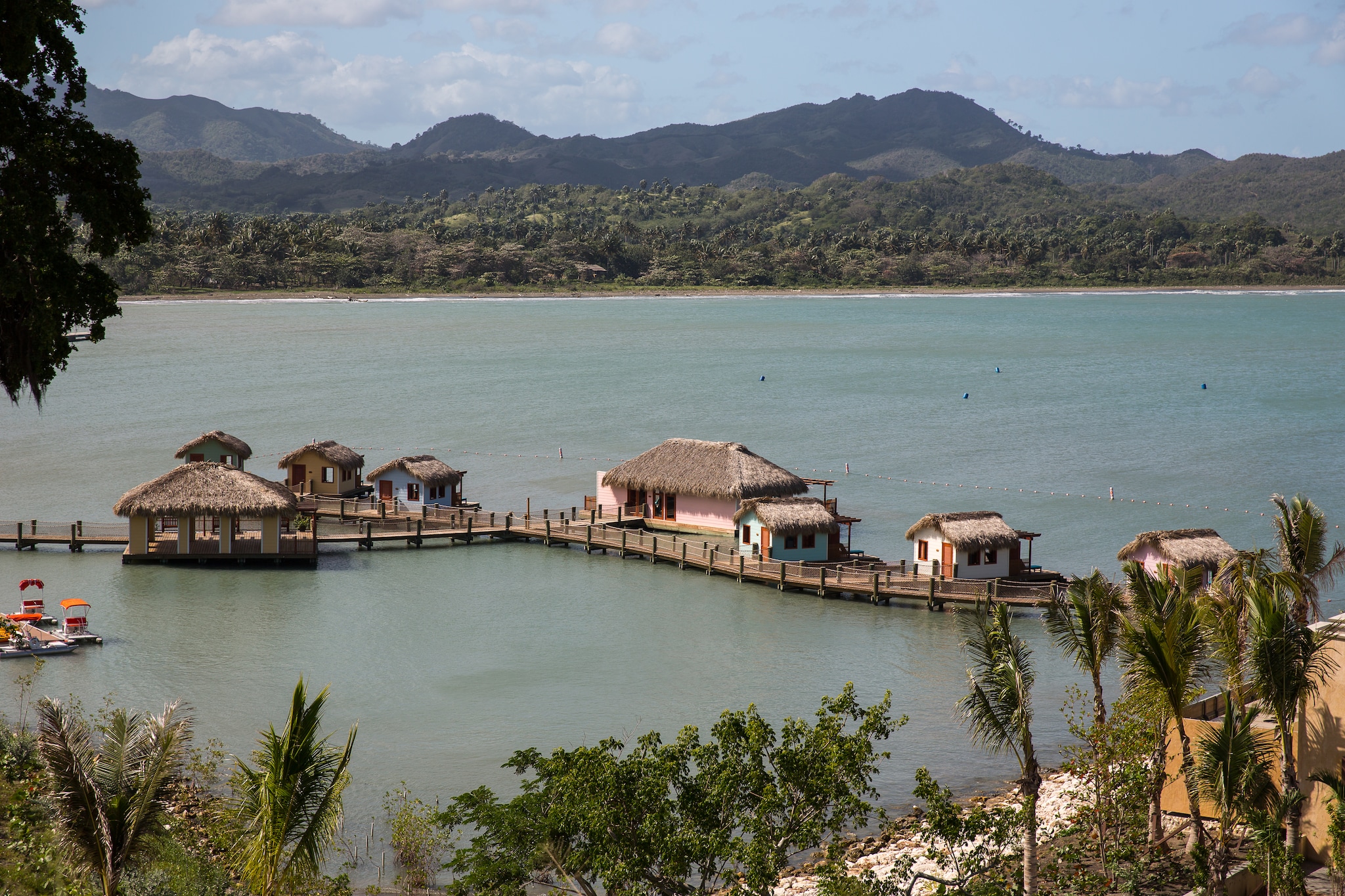 {"metadata_en_GB":{"alt-text":"Thatched houses over the water near Amber Cove, Dominican Republic"},"metadata_en_AU":{"alt-text":"Thatched houses over the water near Amber Cove, Dominican Republic"},"metadata_en_US":{"alt-text":"Thatched houses over the water near Amber Cove, Dominican Republic"}}