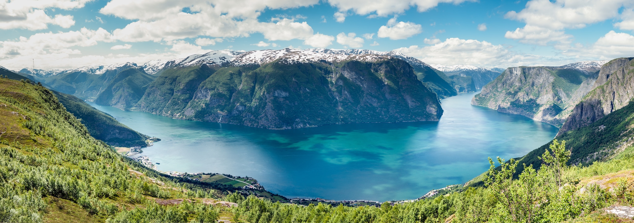 Panoramic view of magnificent inner Aurlandsfjord in Norway at early summer with snow still resting at the mountain summits; Shutterstock ID 206380591; Invoice Number: -