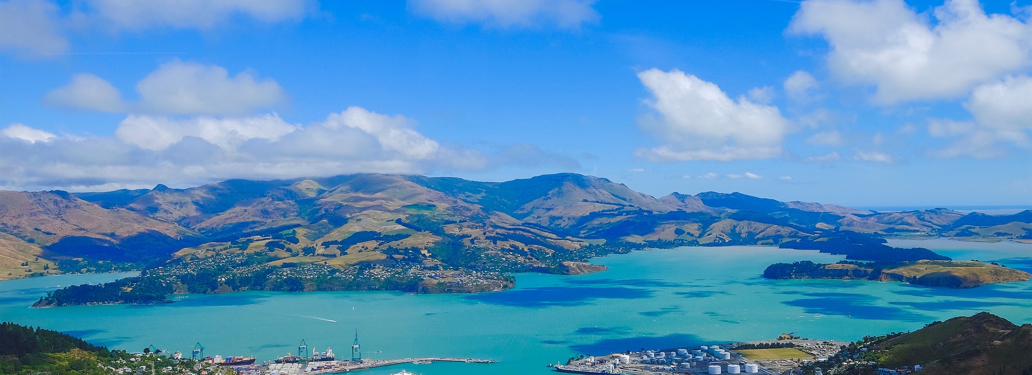 Beautiful view of Lyttelton Port and Harbour from the Christchurch Gondola Station at the top of the Port Hills, Christchurch, Canterbury, New Zealand.; Shutterstock ID 1010118649; Purchase Order: -