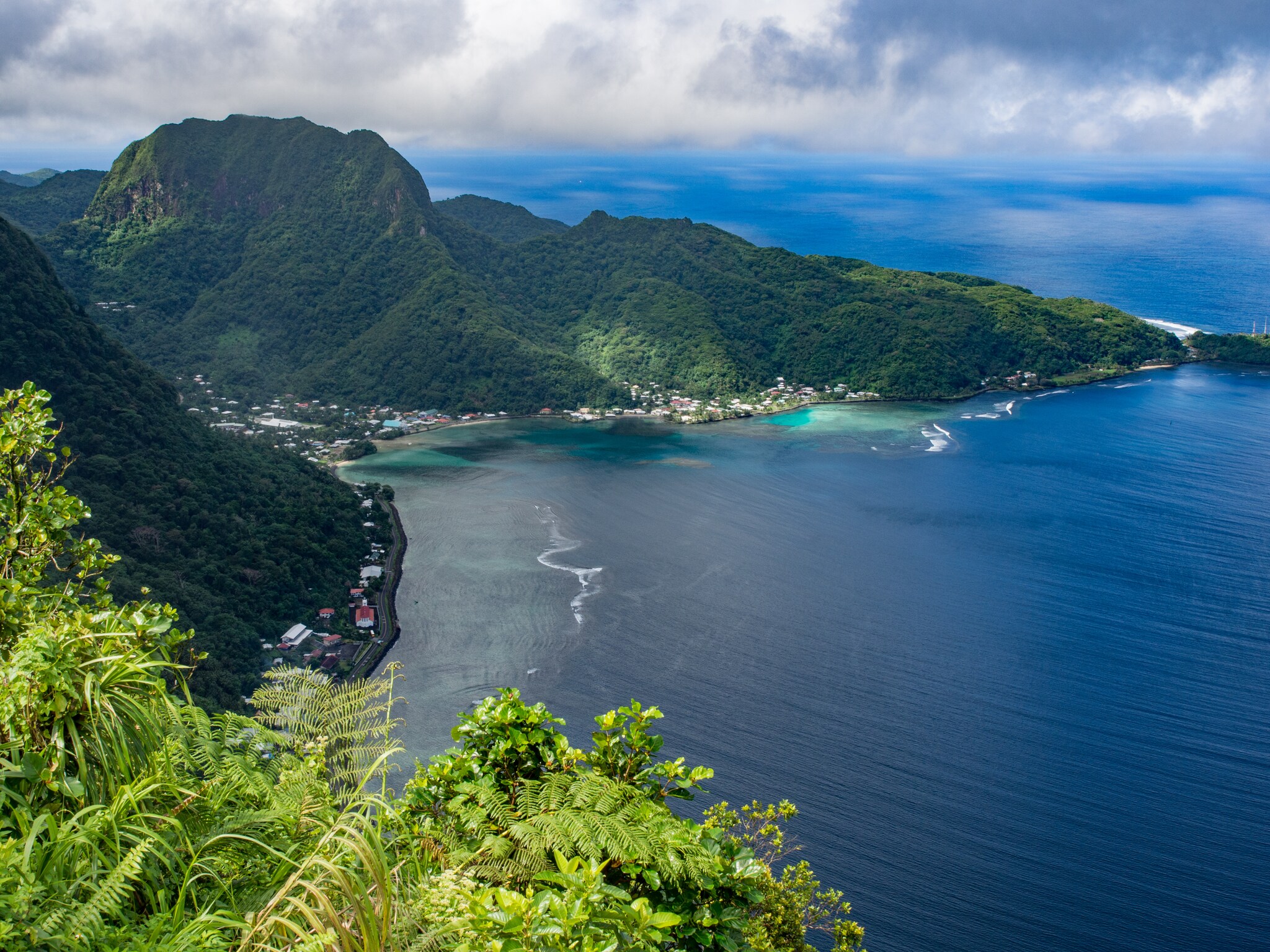 Aerial View of the village of Aua and Rainmaker Mountain on Tutuila; Shutterstock ID 427032988
