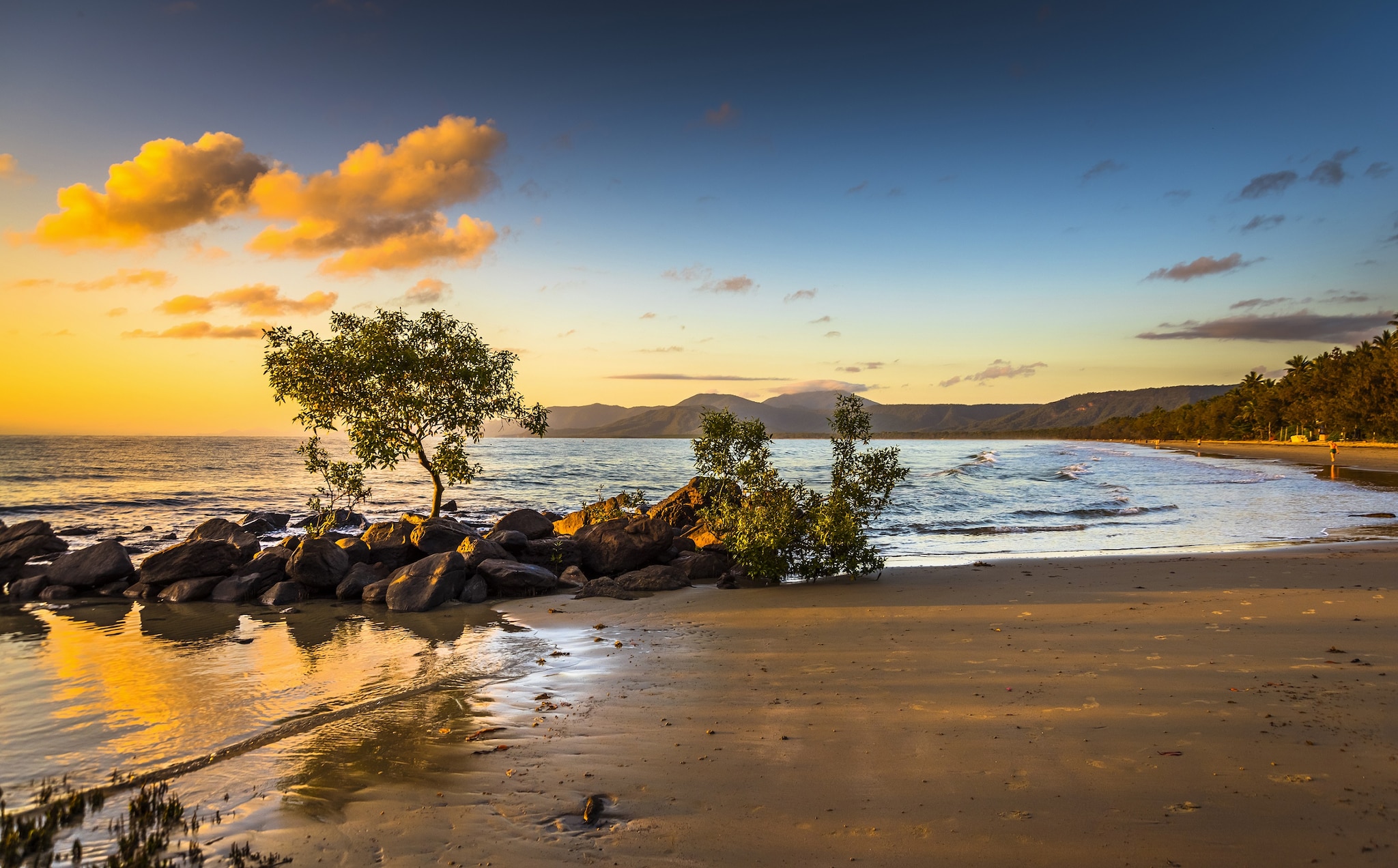 colourful sunrise 4 mile beach tropical Port Douglas Coral sea clear calm ocean morning north queensland; Shutterstock ID 1050857453; Purchase Order: -