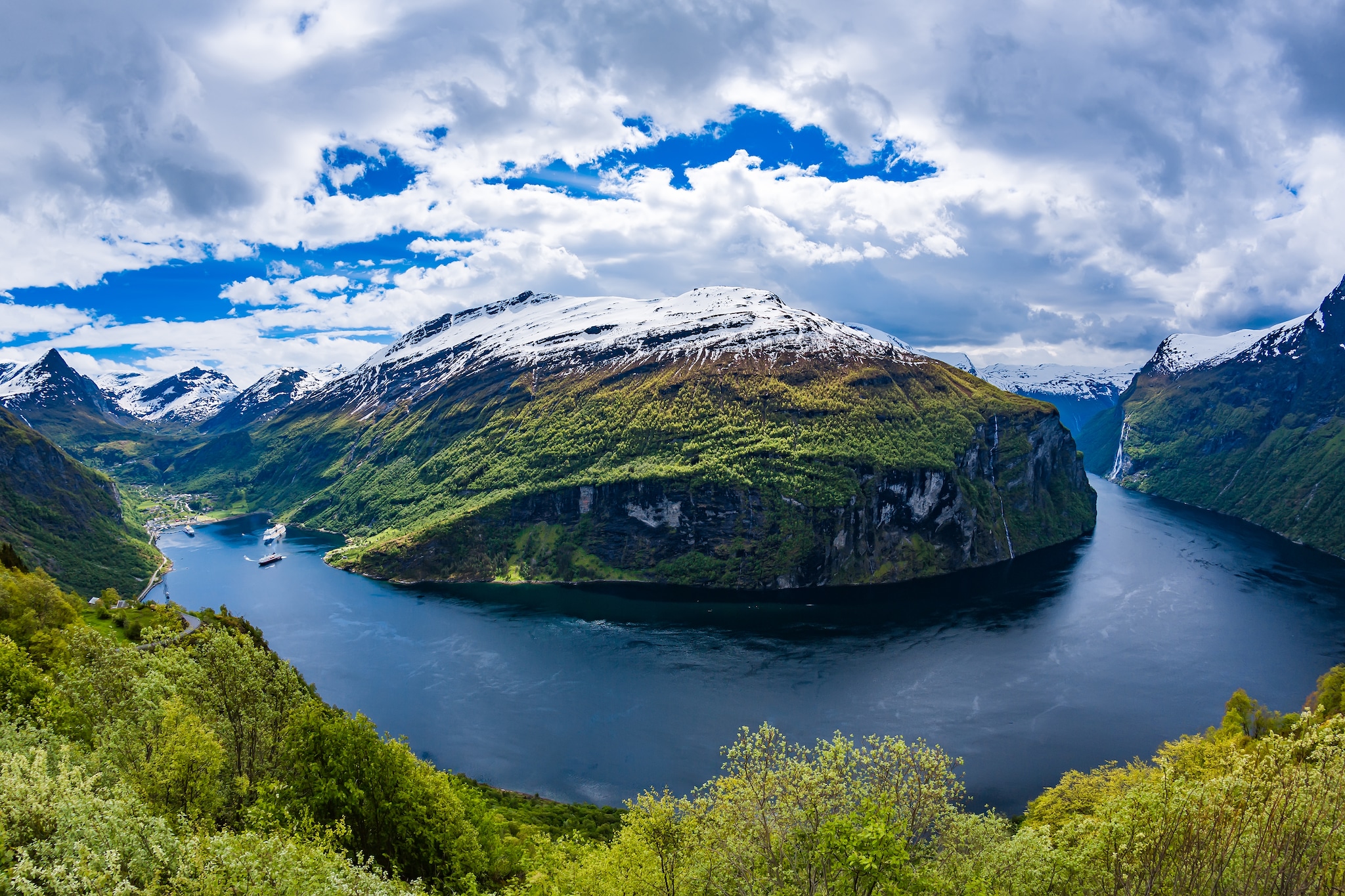 Geiranger fjord, Beautiful Nature Norway. It is a 15-kilometre (9.3 mi) long branch off of the Sunnylvsfjorden, which is a branch off of the Storfjorden (Great Fjord).; Shutterstock ID 386621515; Invoice Number: -