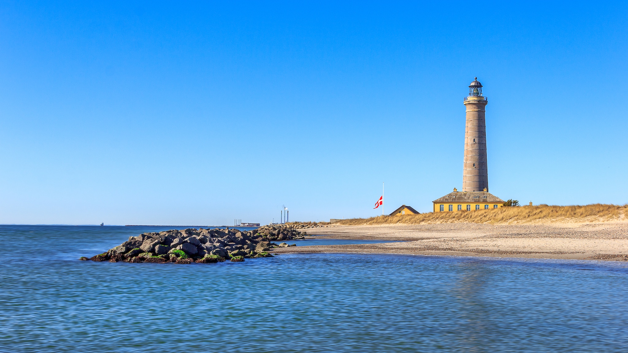 The Grey Lighthouse on the shores of Skagen, Denmark