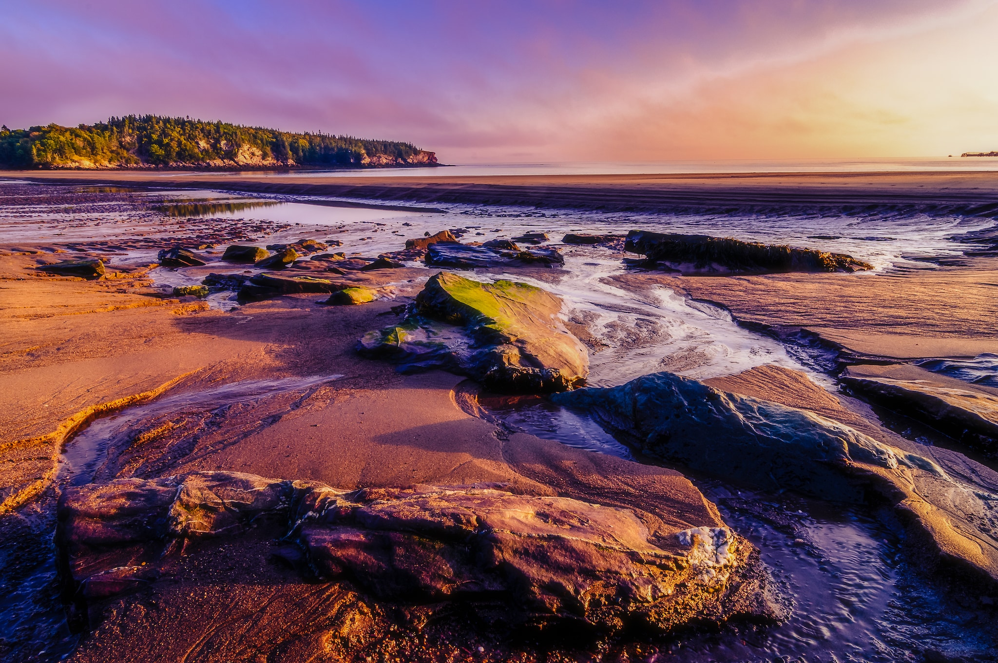 Sunset ambiance on a beach near St. John, New Brunswick ; Shutterstock ID 1164188104; purchase_order: -; job: -; client: -; other: -