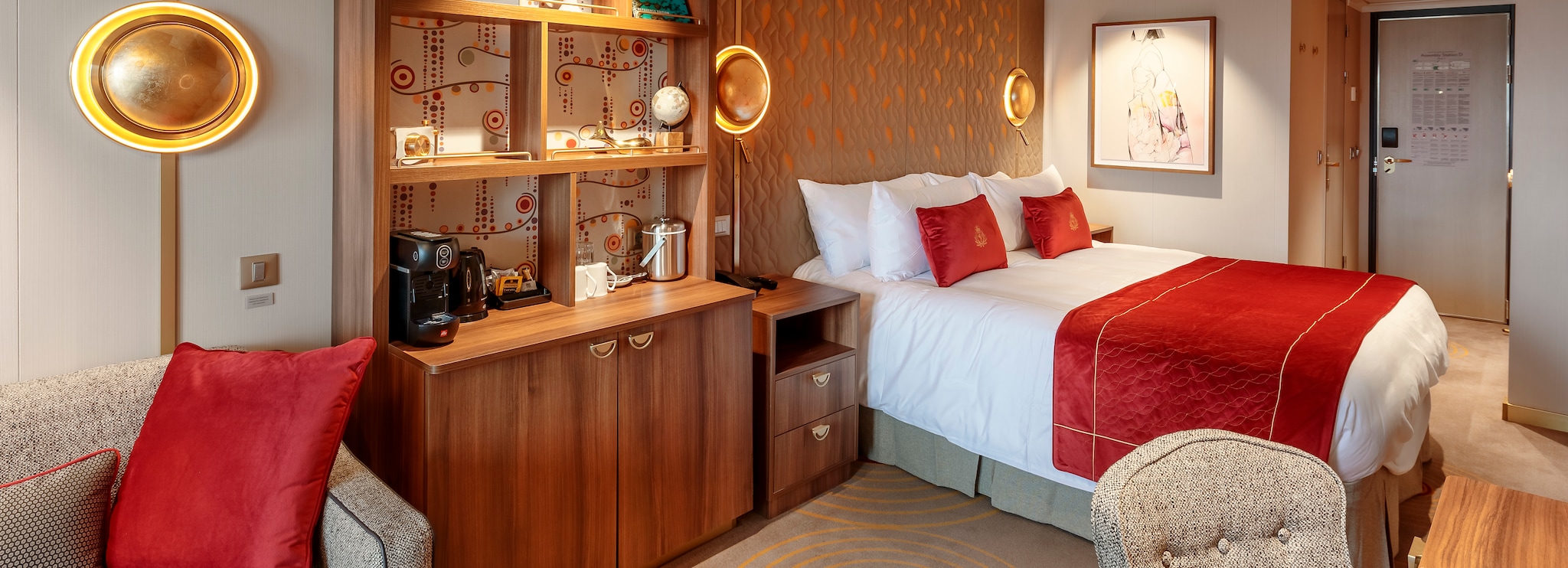 {"metadata_en_GB":{"alt-text":"A Queen Anne Princess Grill Suite bedroom, showing seating area, desk, bar with coffee maker and kingsize bed"},"metadata_en_AU":{"alt-text":"A Queen Anne Princess Grill Suite bedroom, showing seating area, desk, bar with coffee maker and kingsize bed"},"metadata_en_US":{"alt-text":"A Queen Anne Princess Grill Suite bedroom, showing seating area, desk, bar with coffee maker and kingsize bed"}}