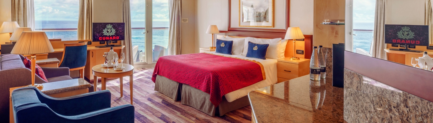 {"metadata_en_GB":{"alt-text":"Queens Grill suite on board Queen Elizabeth"},"metadata_de_DE":{"alt-text":"Queens Grill suite on board Queen Elizabeth"},"metadata_en_AU":{"alt-text":"Queens Grill suite on board Queen Elizabeth"},"metadata_en_US":{"alt-text":"Queens Grill suite on board Queen Elizabeth"}}