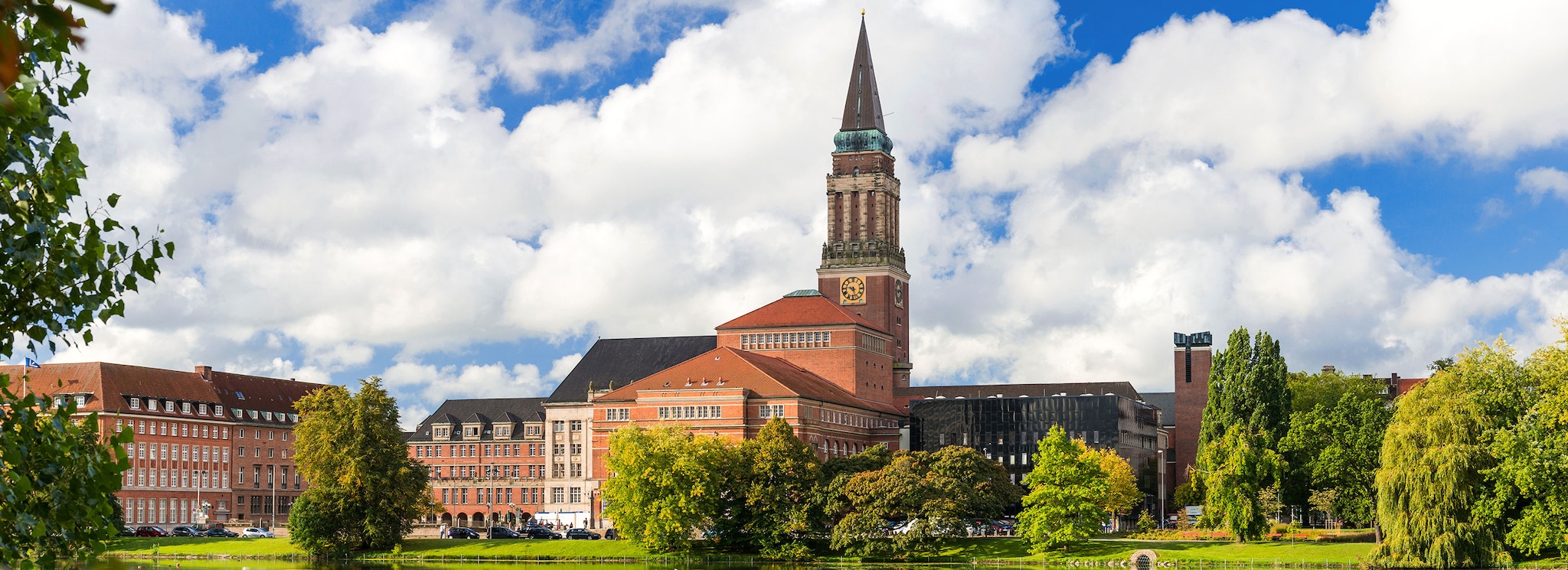 Kiel Town Hall during the day with reflection in the lake near by