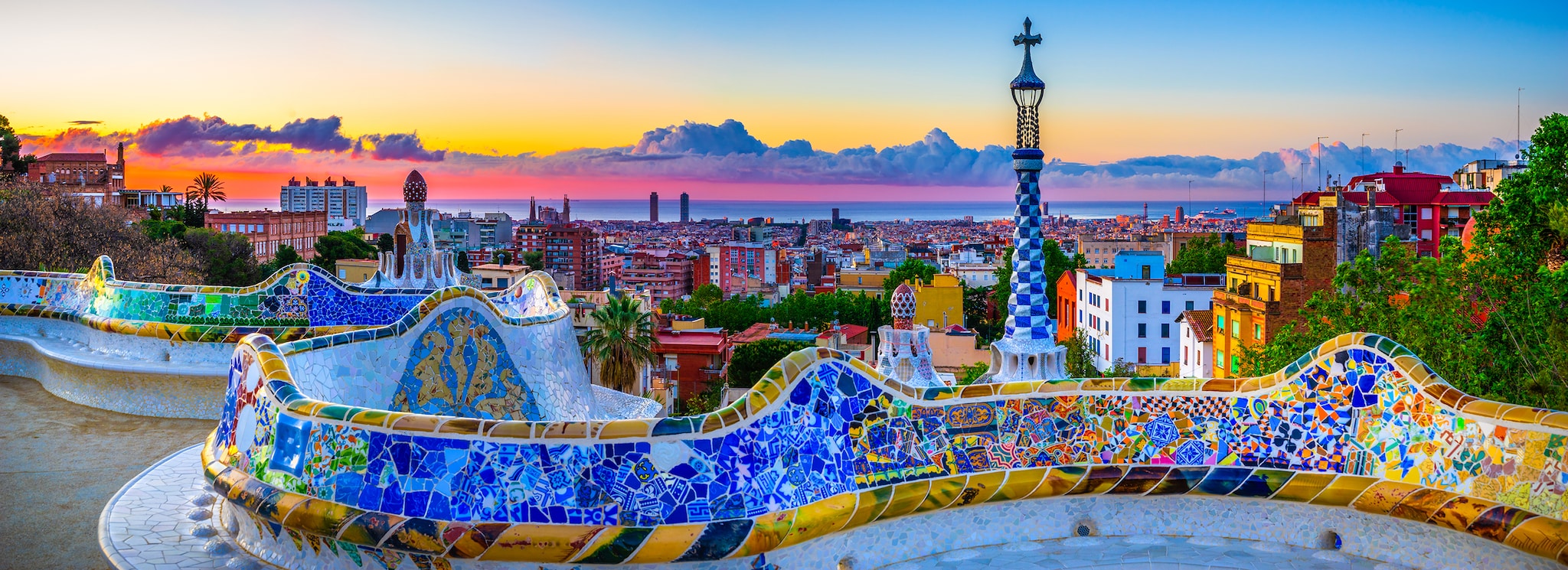 {"metadata_en_GB":{"alt-text":"Colourful mosaics at Park Guell in Barcelona"},"metadata_en_AU":{"alt-text":"Colourful mosaics at Park Guell in Barcelona"},"metadata_en_US":{"alt-text":"Colourful mosaics at Park Guell in Barcelona"}}