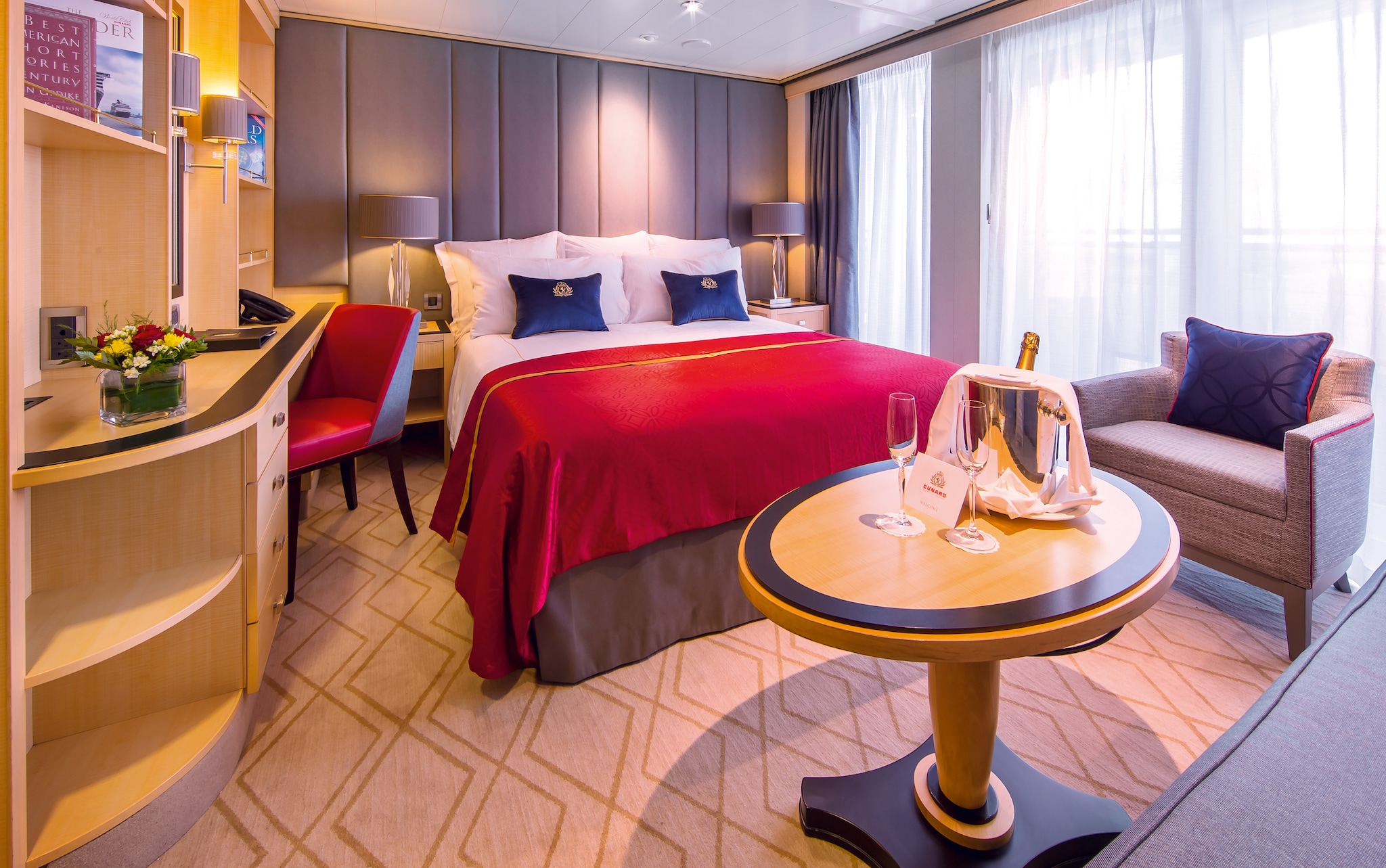 {"metadata_en_GB":{"alt-text":"A remastered Princesss Grill suite on QM2, including double bed, desk, floor-to-ceiling windows and champagne ready to drink."},"metadata_de_DE":{"alt-text":"Eine neu gestaltete Princesss Grill-Suite auf QM2 mit Doppelbett, Schreibtisch, bodentiefen Fenstern und Champagner zum Trinken."},"metadata_en_AU":{"alt-text":"A remastered Princesss Grill suite on QM2, including double bed, desk, floor-to-ceiling windows and champagne ready to drink."},"metadata_en_US":{"alt-text":"A remastered Princesss Grill suite on QM2, including double bed, desk, floor-to-ceiling windows and champagne ready to drink."}}