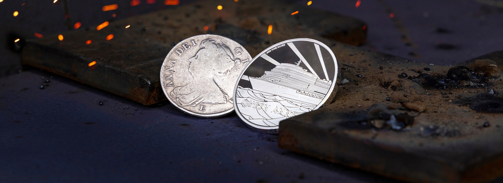 Two coins for the Queen Anne keel laying ceremony pictured in the keel where they will be welded. One was an original 18th coin from the reign of Queen Anne, the second was a solid silver coin struck for Cunard to mark the occasion.Client: Cunard.Picture date: Wednesday September 7, 2022.Photograph by Christopher Ison Â©07544044177chris@christopherison.comwww.christopherison.comIMPORTANT NOTE REGARDING IMAGE LICENCING FOR THIS PHOTOGRAPH: This image is supplied to the client under the terms previously agree. No sales are permitted unless expressly agreed in writing by the photographer.